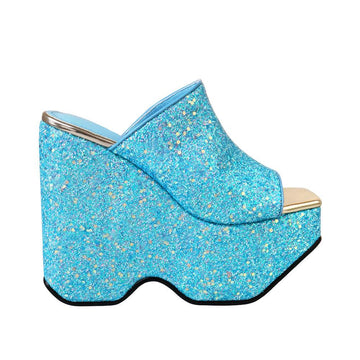 Blue colored platform shoes with slip on design and glittery shine