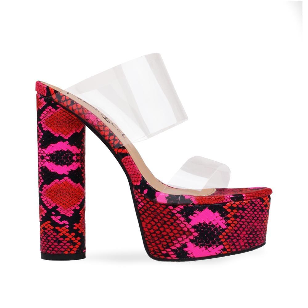 Fuchsia-snake patterned platform heels with clear upper straps and slip-on design 