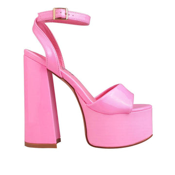 Slip-on pink platform heels with an ankle buckle closure