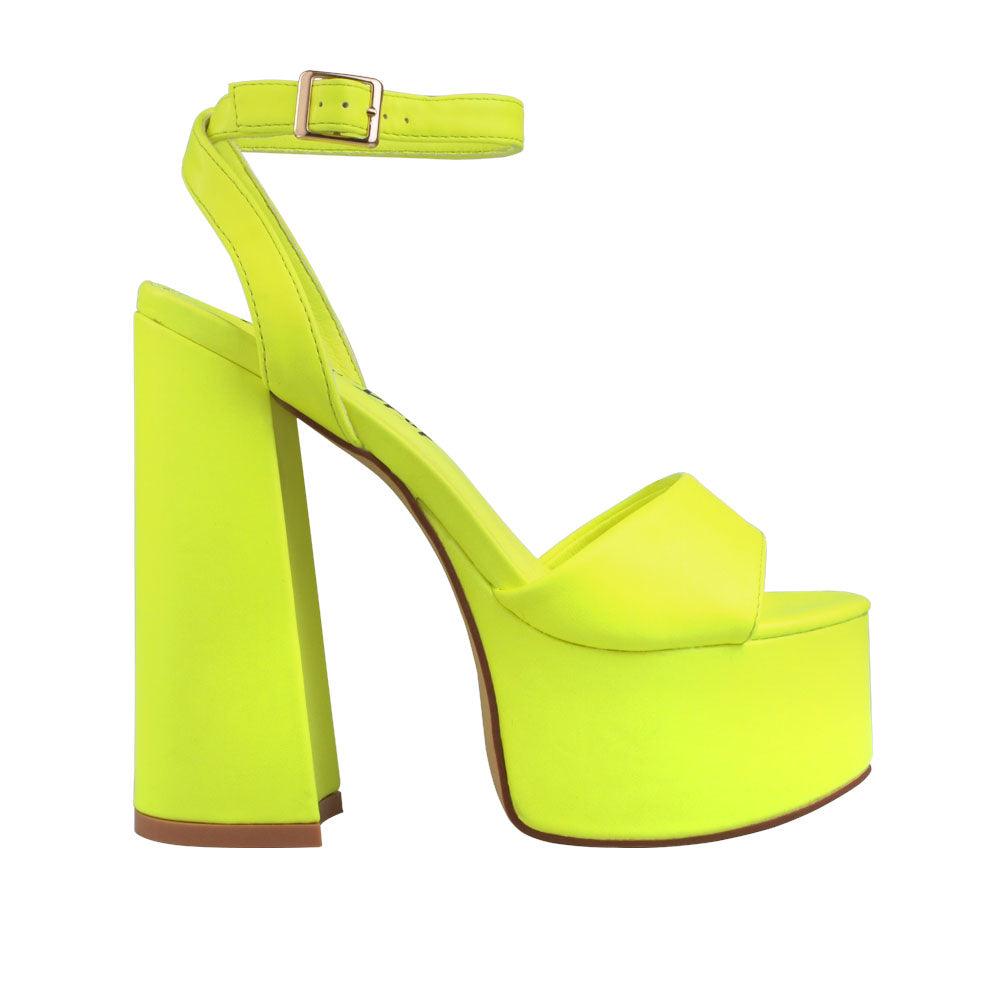 Yellow slip-on platform heels with ankle buckle clasp. and open toe