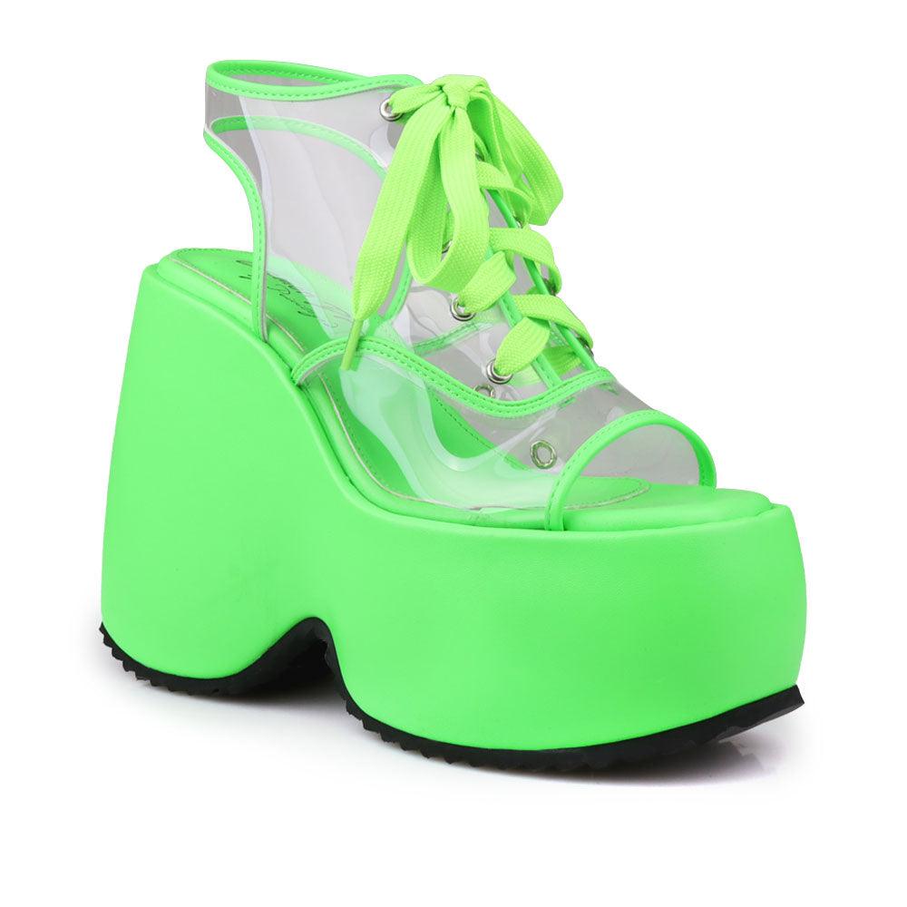 Clear vinyl wedge platform women's shoes in neon green-corner view