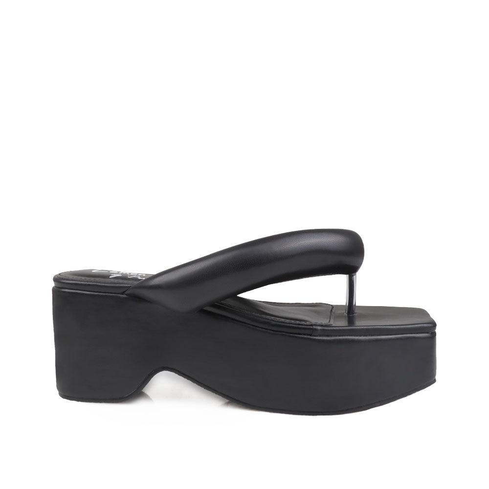 Black vegan leather platform span women's slip ons-side view