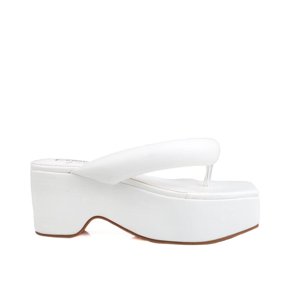 White vegan leather platform span women's slip ons-side view