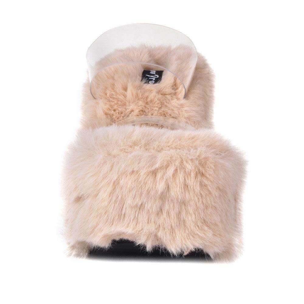 Vinyl upper women's nude wedge slip ons covered in fur-front view