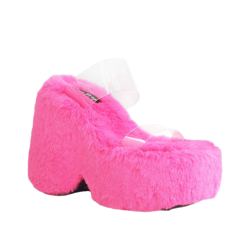 Vinyl upper women's neon pink wedge slip ons covered in fur-corner view