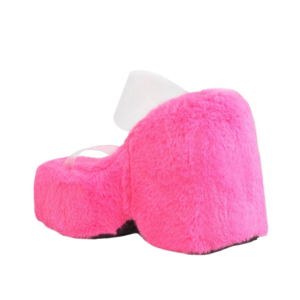 Vinyl upper women's neon pink wedge slip ons covered in fur-posterior view