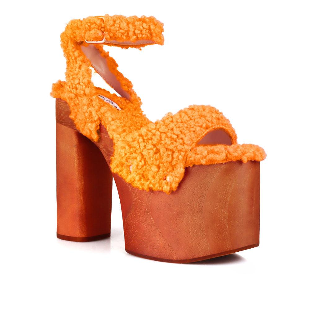 Shaggy upper women's platform block heel in orange-corner view