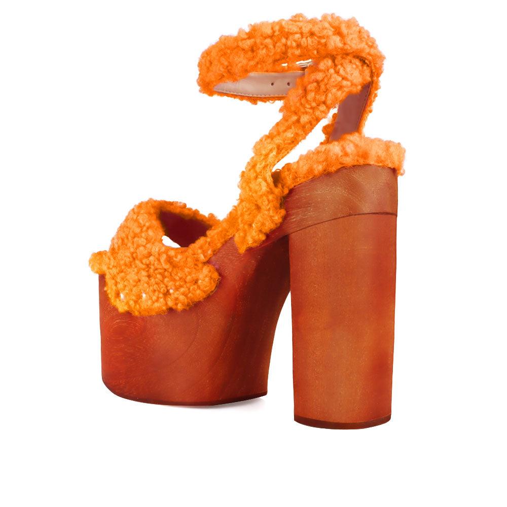 Shaggy upper women's platform block heel in orange-posterior view