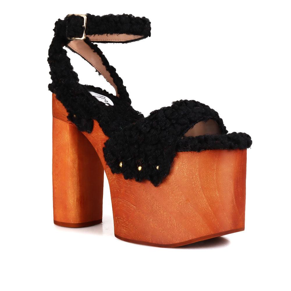 Shaggy upper women's platform block heel in black-corner view