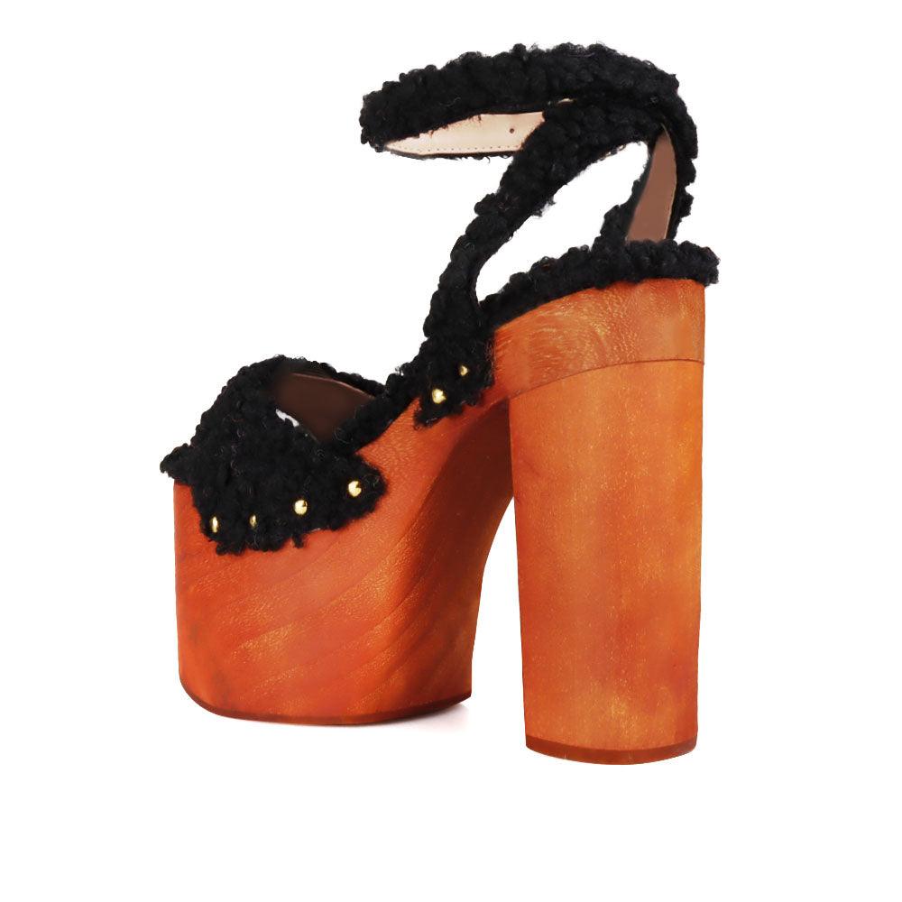 Shaggy upper women's platform block heel in black-posterior view