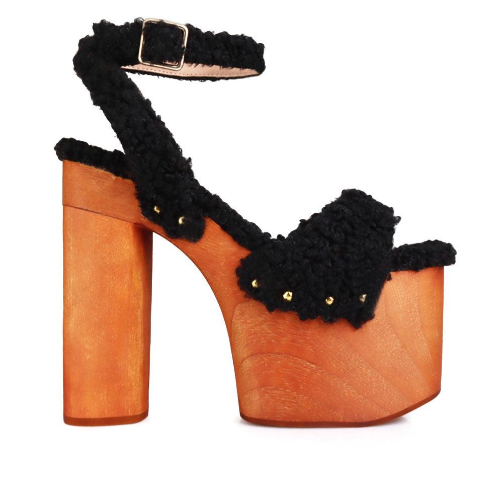 Shaggy upper women's platform block heel in black-side view