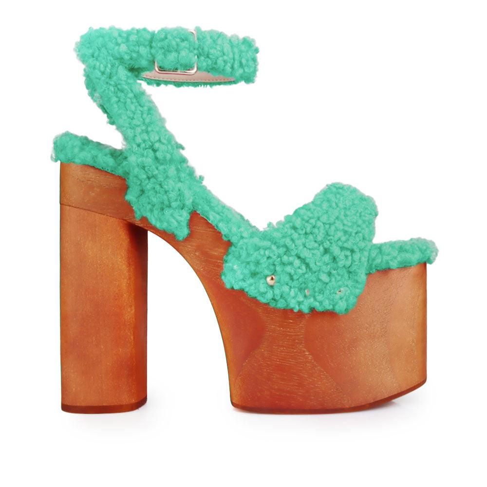 Shaggy upper women's platform block heel in green-side view