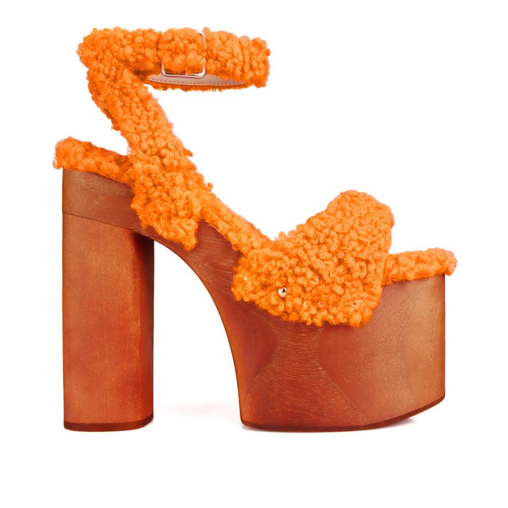 Shaggy upper women's platform block heel in orange-side view