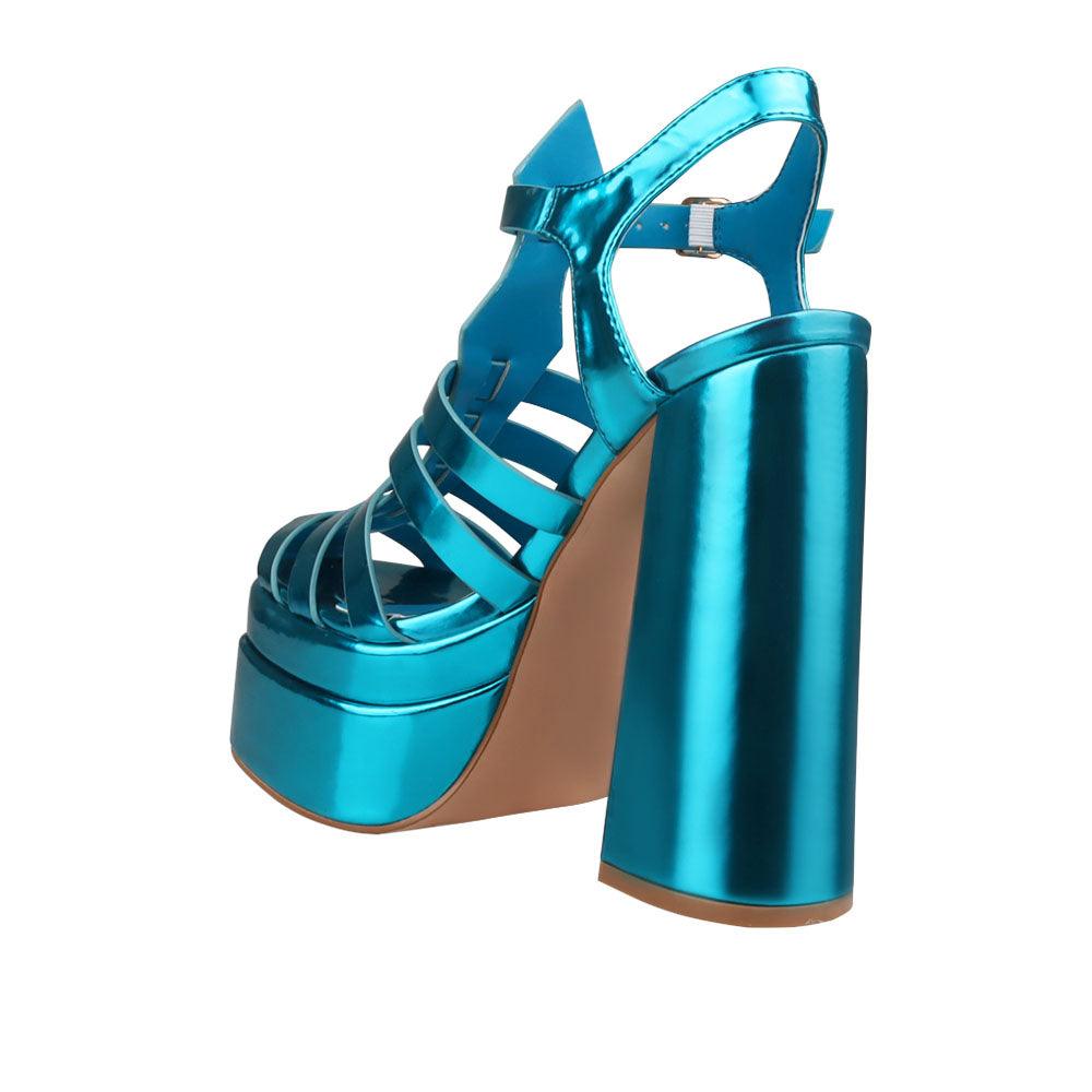 Vegan leather metallic women's block heel with platform in teal-posterior view