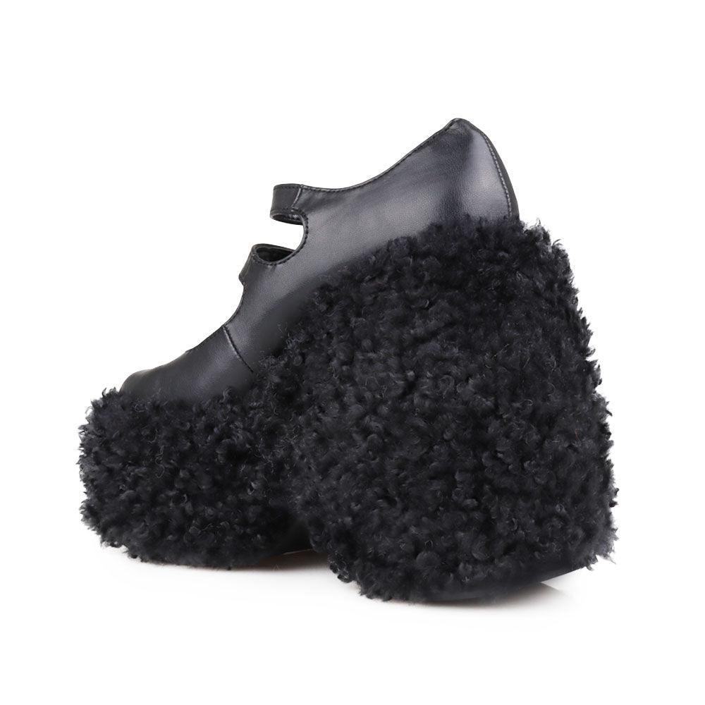 Women's shaggy wedge heel in black-posterior view