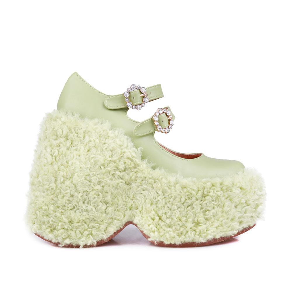 Women's shaggy wedge heel in green-side view