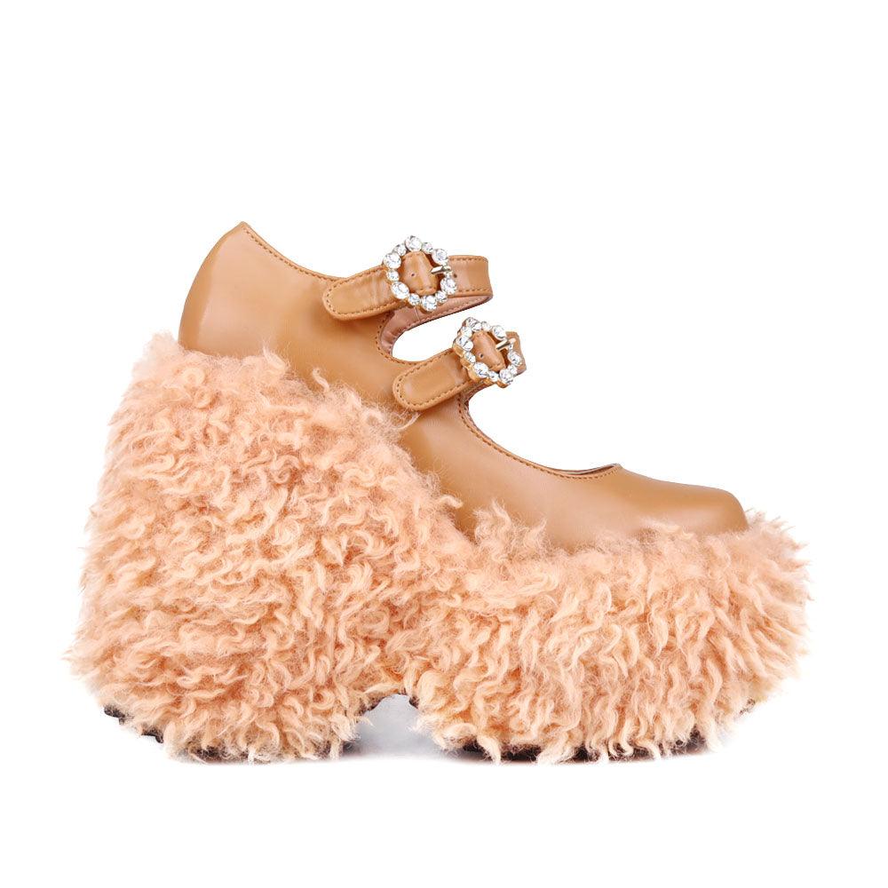 Women's shaggy wedge heel in nude-side view