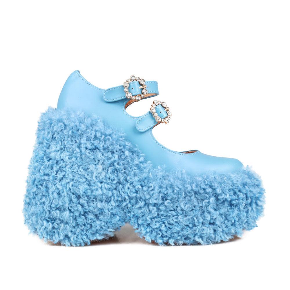 Women's shaggy wedge heel in turquoise-side view