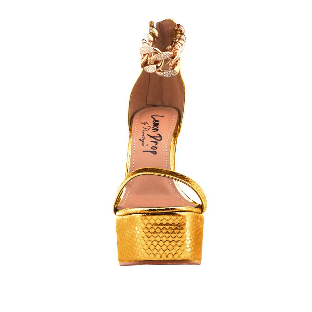 Gold vegan leather women's heel with ankle chain-front view