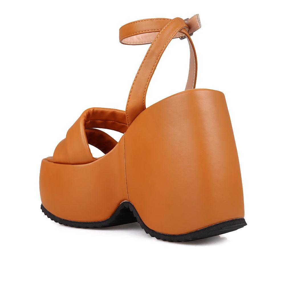 Tan coloured suede platform women's heel-posterior view