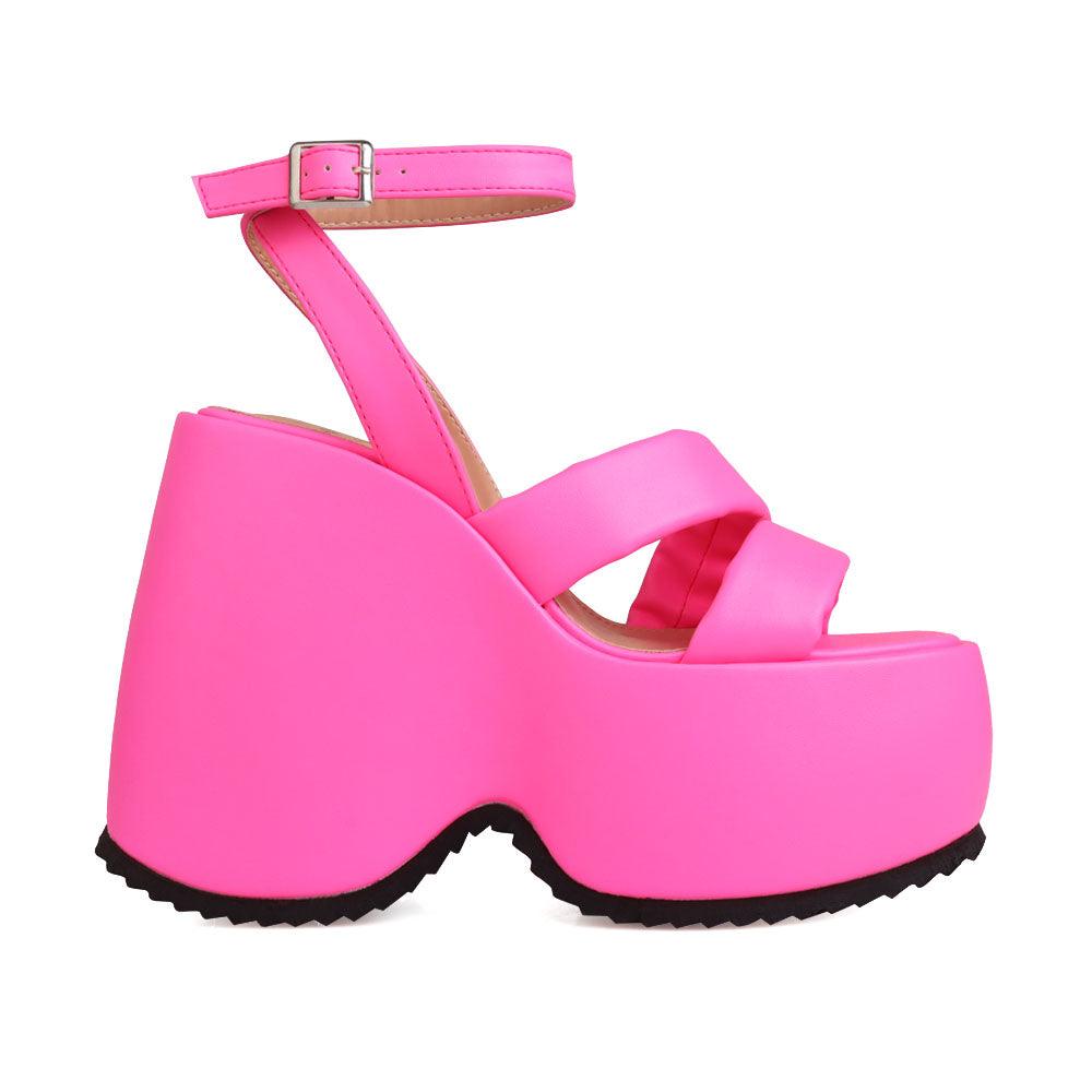 Neon pink suede platform women's heel-side view