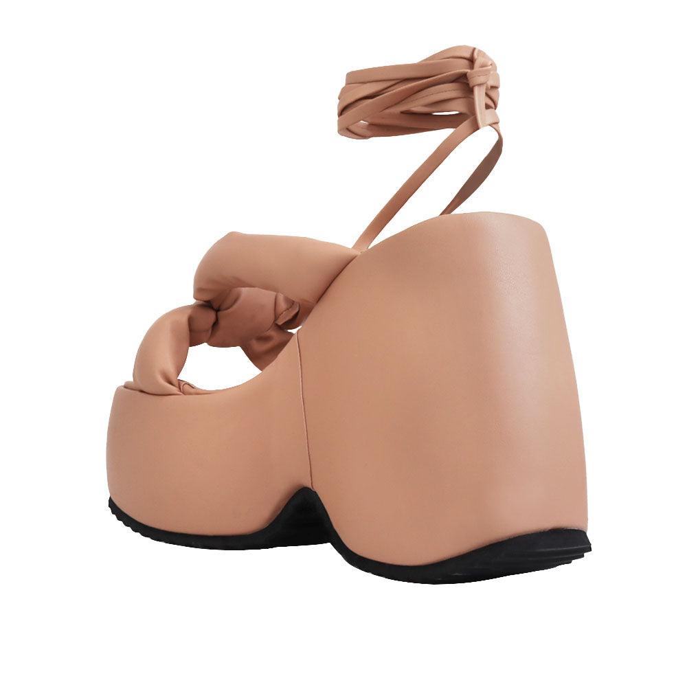 Nude vegan leather wedge women's heel-posterior view