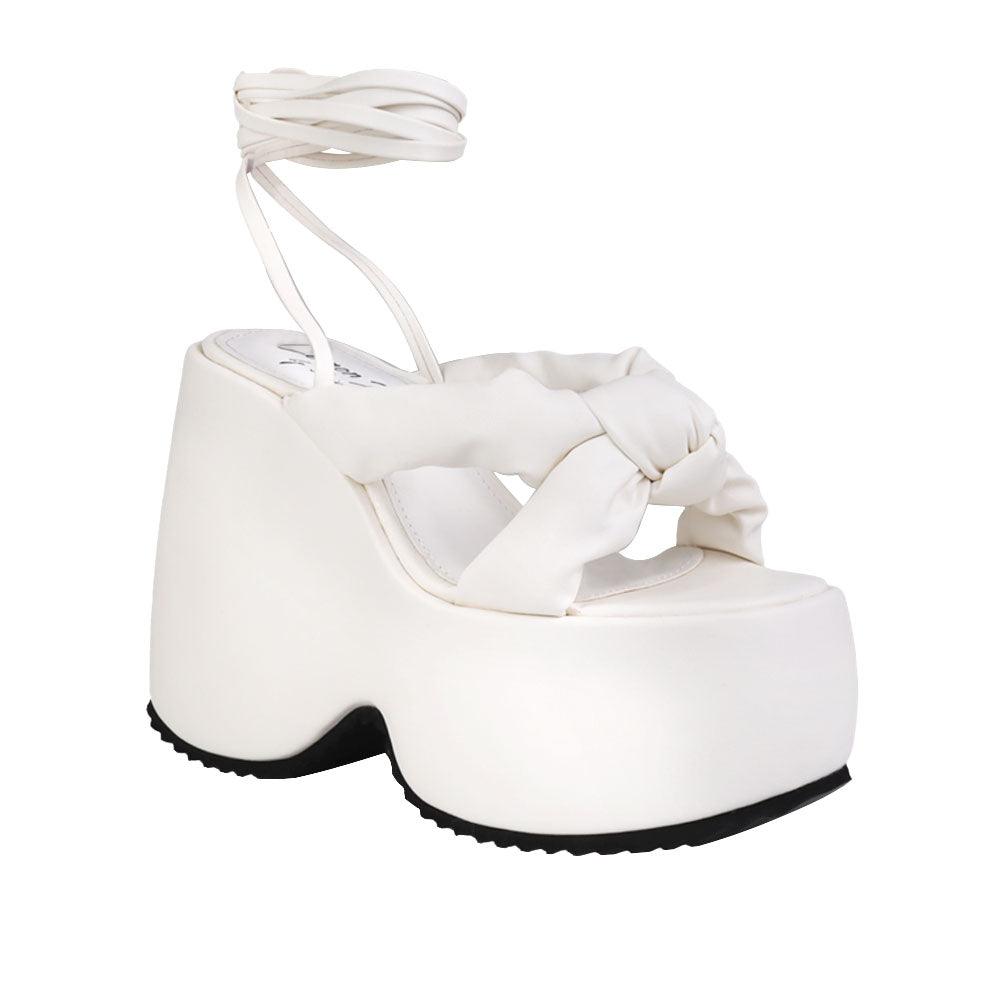 White vegan leather wedge women's heel-corner view