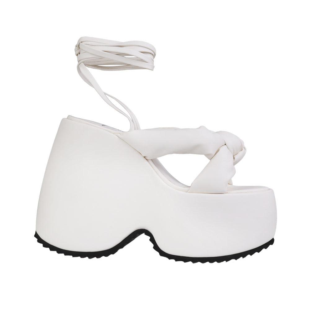 White vegan leather wedge women's heel-side view