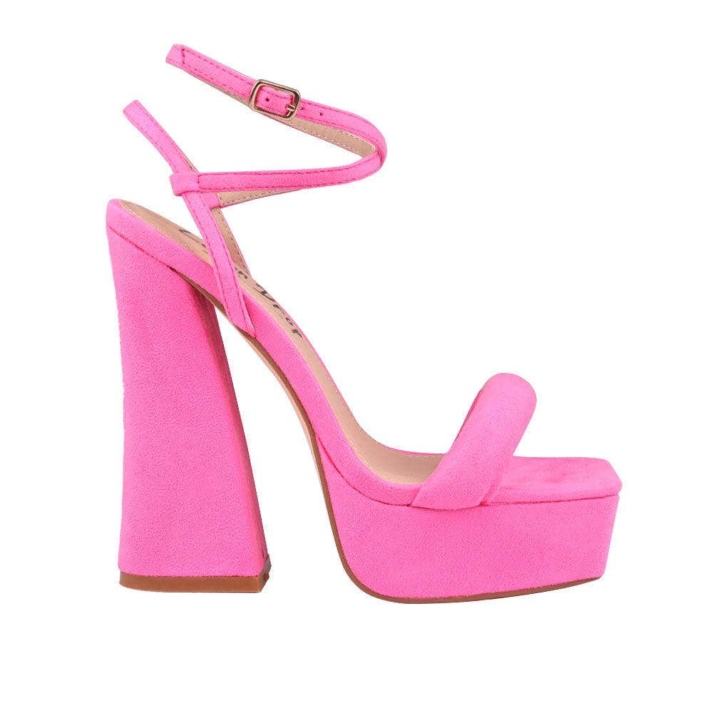 Pink coloured suede sandals on chunky heel women shoes-side view