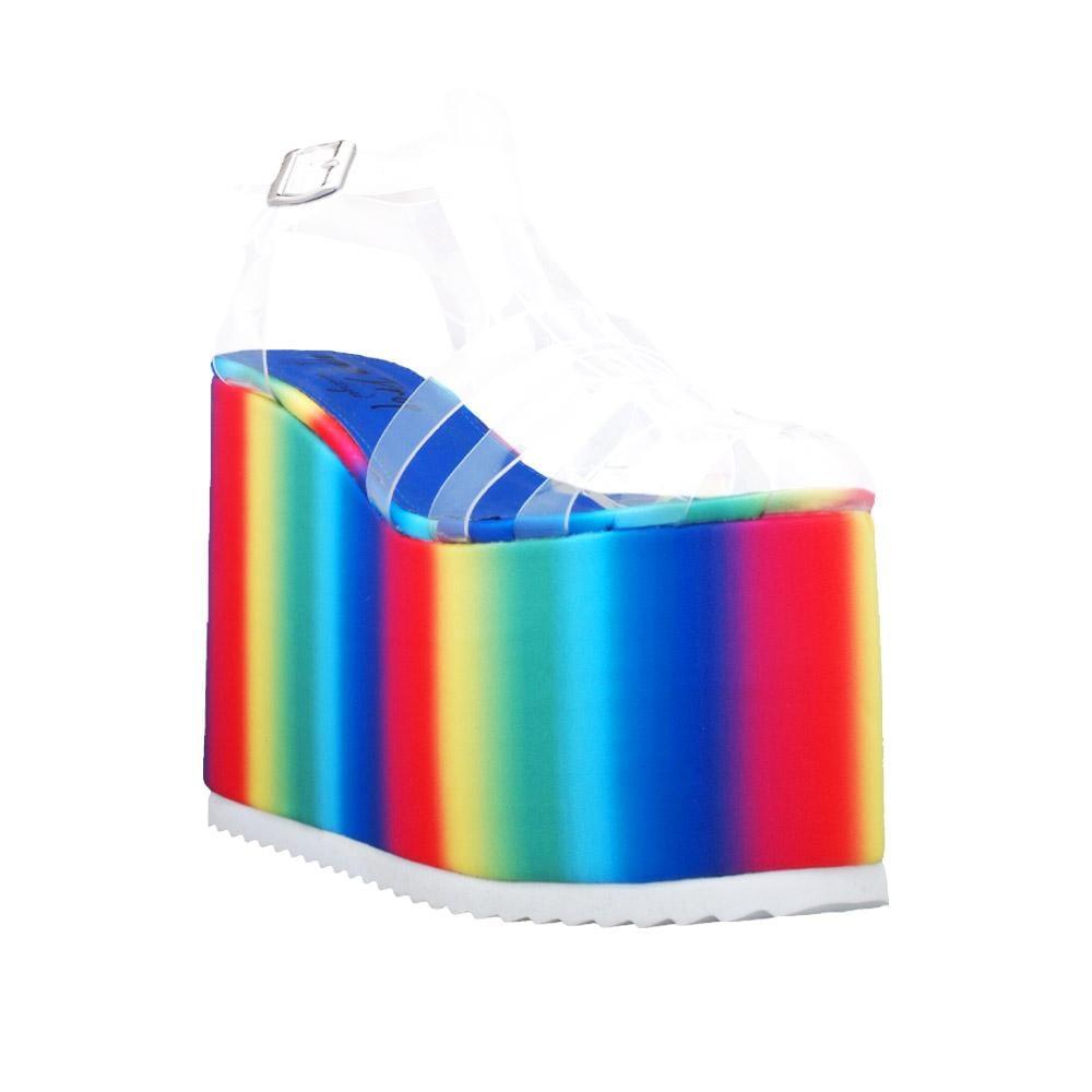 Rainbow coloured vinyl platform bootie with a faux fur-wrapped platform-corner view