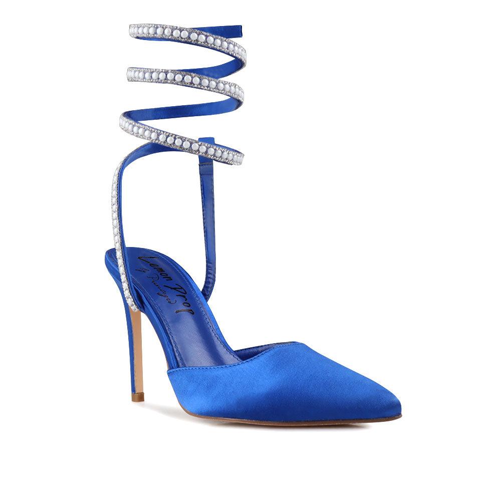 Blue colored women's pump shoes with beaded ankle buckle fastening-corner view