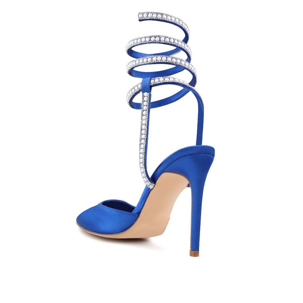 Blue colored women's pump shoes with beaded ankle buckle fastening-posterior view