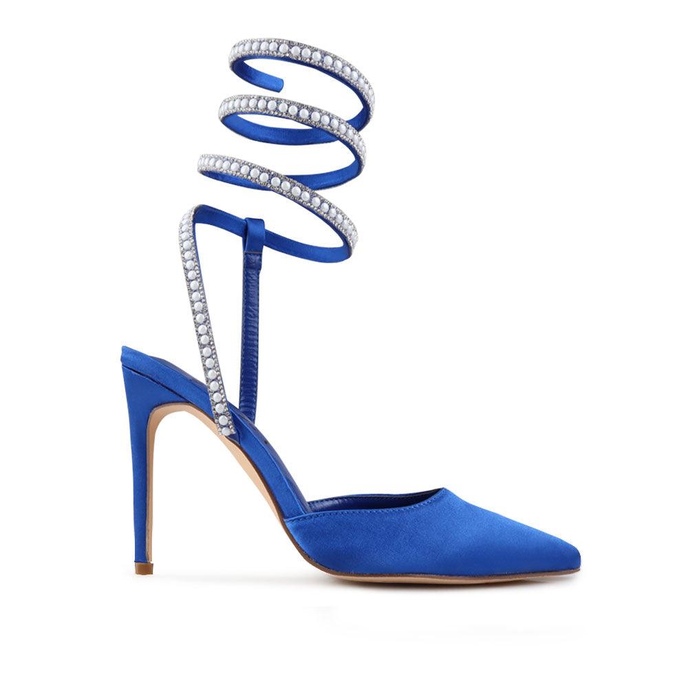 Blue colored women's pump shoes with beaded ankle buckle fastening-side view