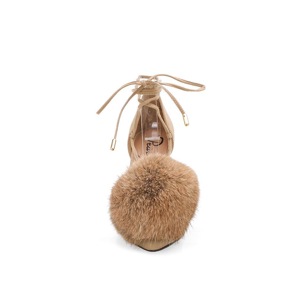 Taupe-colored high-heeled pumps for women with an ankle wrap lace up and front faux fur pom-front view