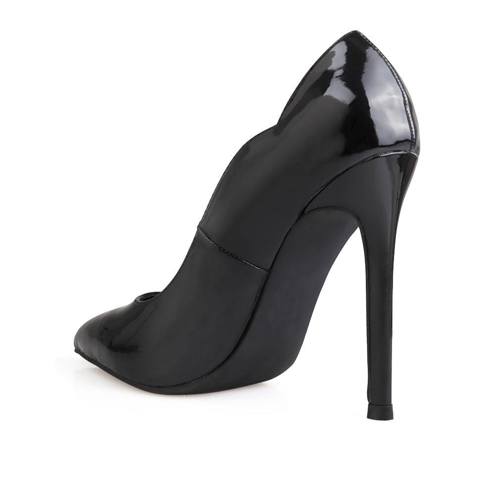 Women's pump heel in black-posterior view