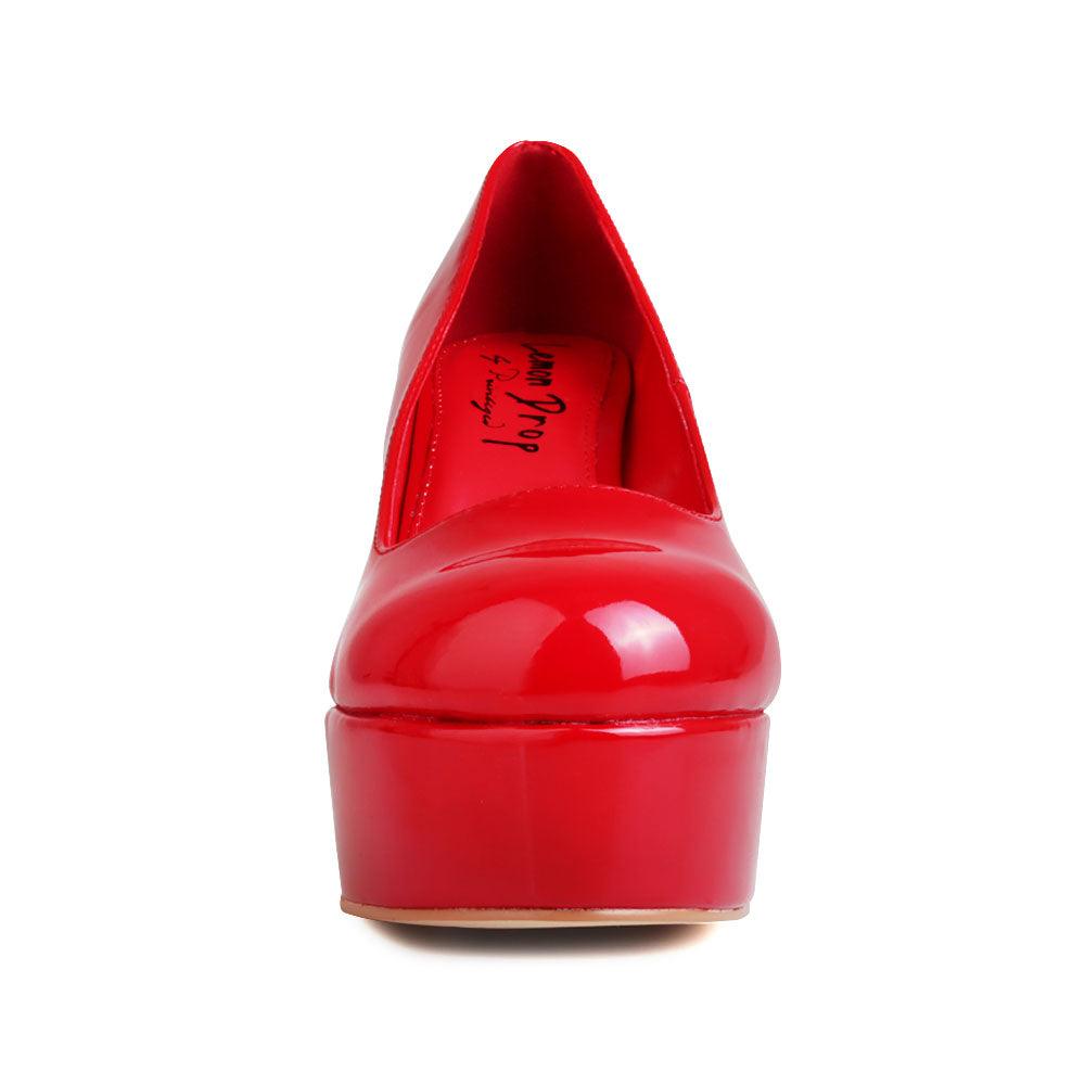 Red women pumps with platform heel-front view