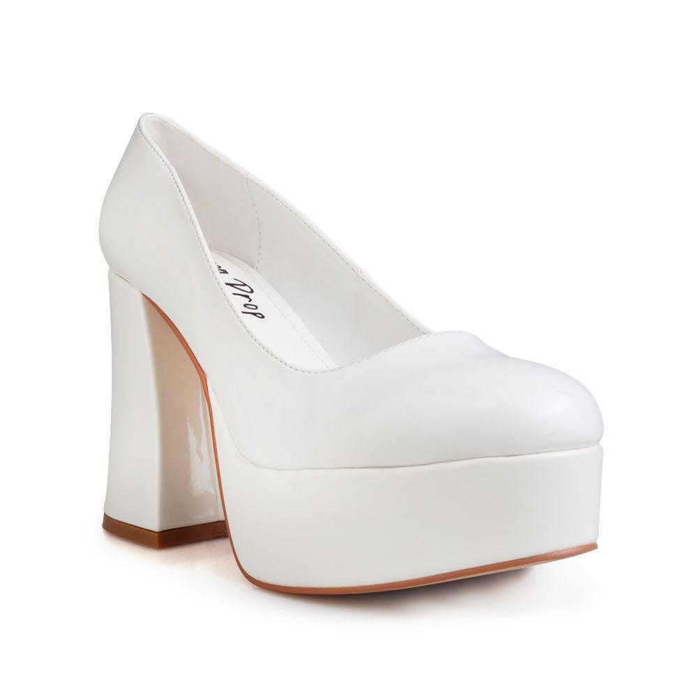 White women pumps with platform heel-corner view