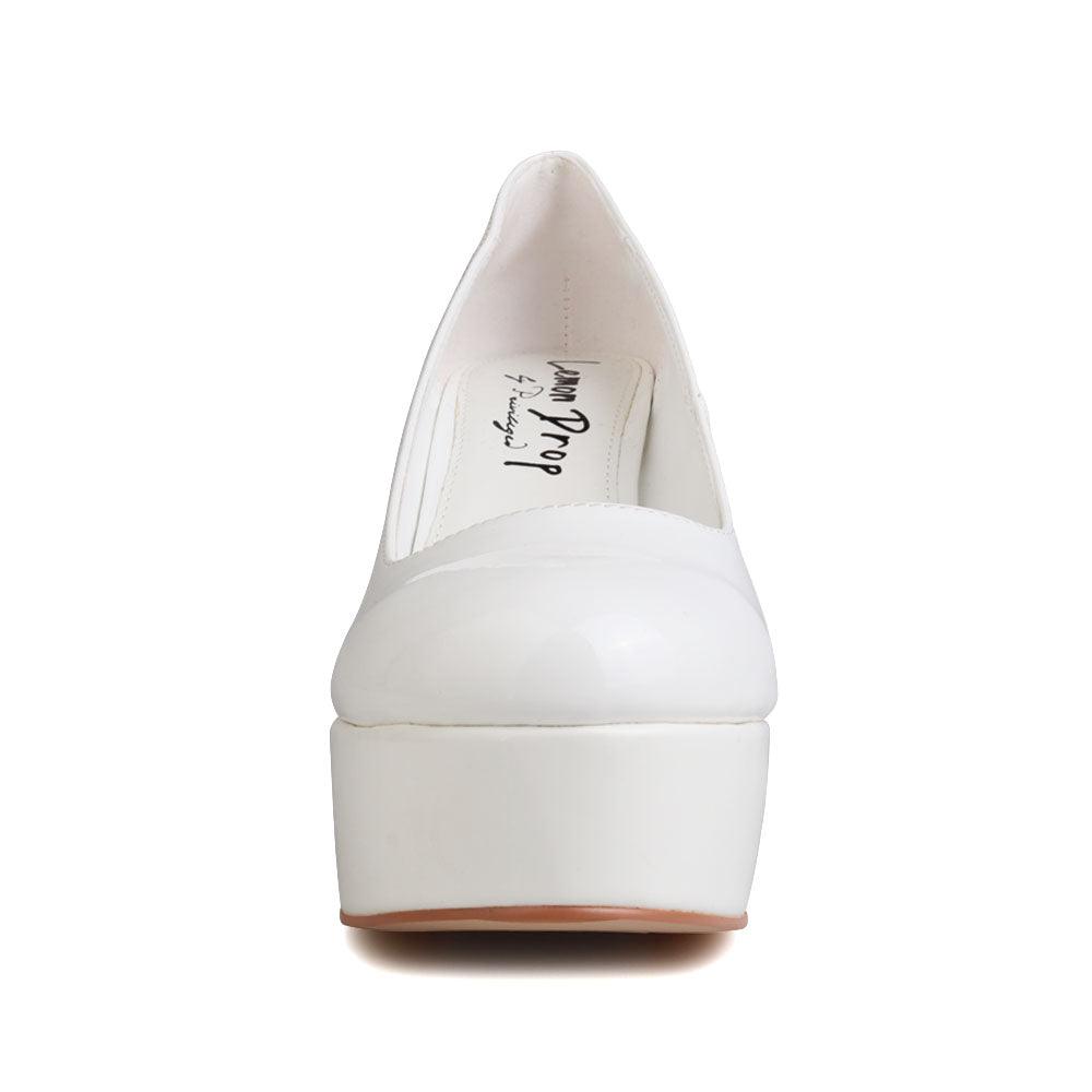 White women pumps with platform heel-front view