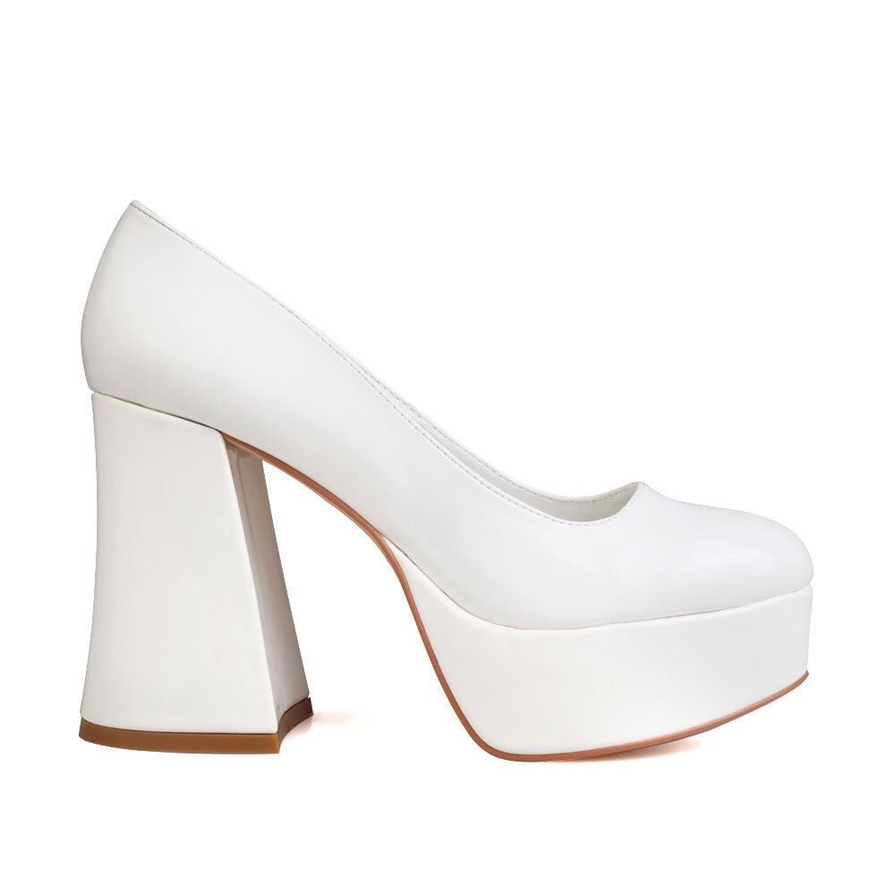 White women pumps with platform heel-side view