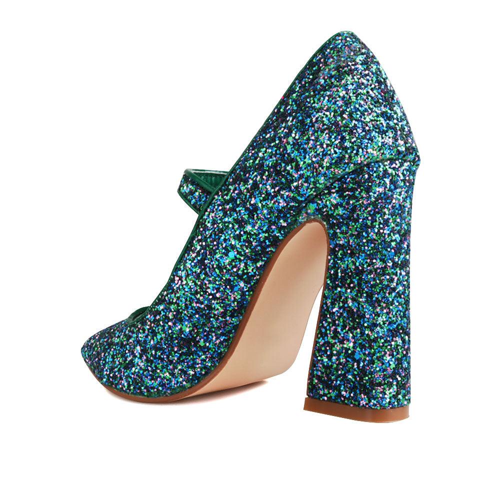 Glittery women block heels in peacock-posterior view