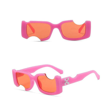 Pink women's sunglasses with orange tinted glass-side view