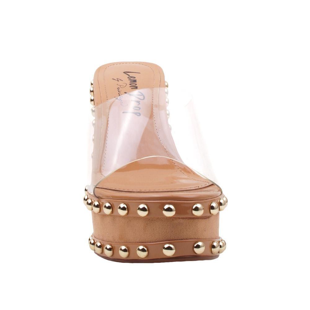 Women's metallic studded tan-colored wedge shoes with a transparent top-front view