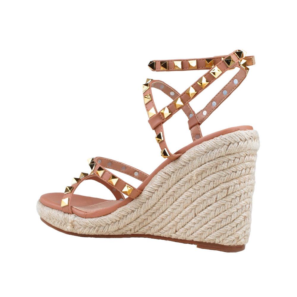 Tan colored women shoes with jute platform-posterior view