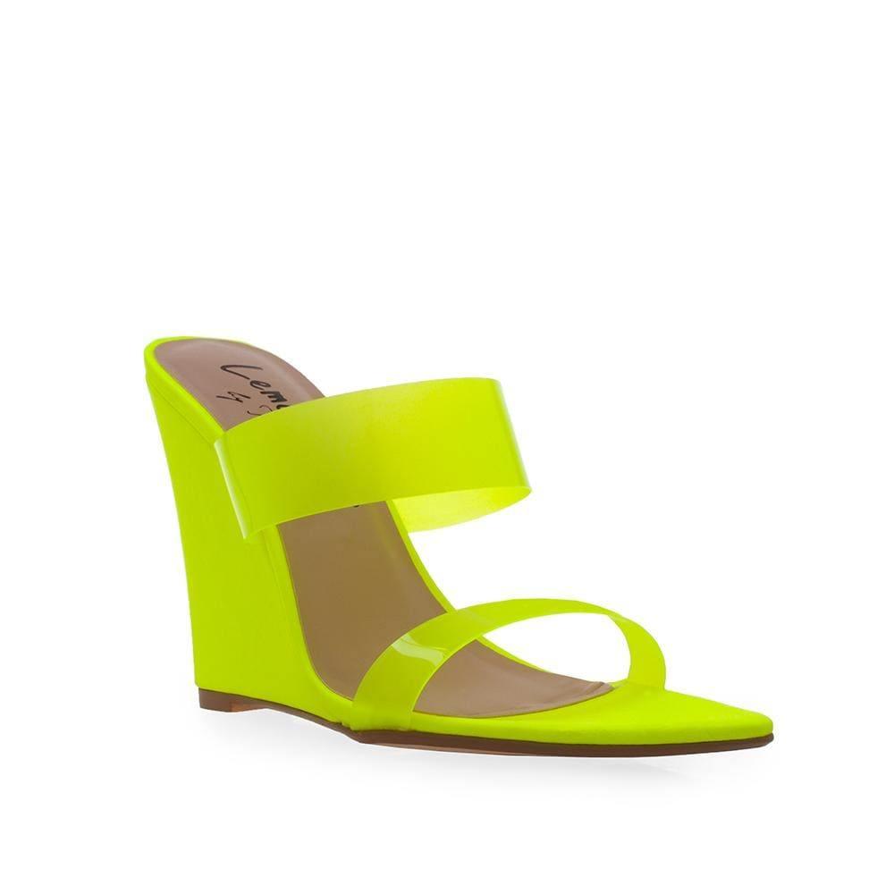 Yellow colored women heels with vinyl upper strap