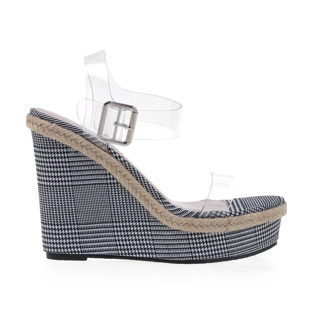 Black and white colored women wedges heels with clear vinyl upper