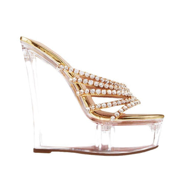 Transparent wedge shoes with golden upper and jewel accent   
