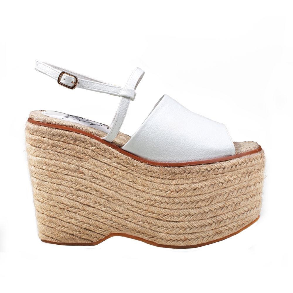 Tan wedge with white upper and ankle buckle clasp